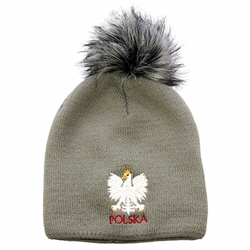 Display your Polish heritage!! Black and gray stretch ribbed-knit winter cap with the word Polska and an embroidered Polish Eagle.. Easy care acrylic fabric. Once size fits most. Made In Poland.