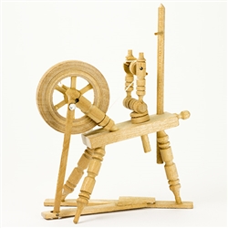 A beautiful example of a typical old fashioned spinning wheel.  Made In Poland.