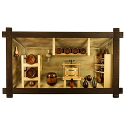 Poland has a long history of craftsmen working with wood in southern Poland. Their workshops produce beautiful hand made boxes, plates and carvings.  This shadow box is a look inside a traditional Polish doctor's office.  Note the nice attention to detail
