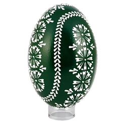 This beautifully designed egg is dyed one color (dark green) then white wax is melted and applied to form an intricate design which is left on the surface. The egg is emptied. Stand not included.