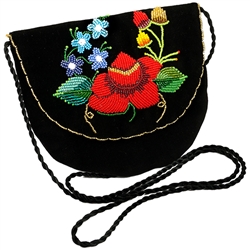 Hand beaded purse made from velvet. Fully lined. Extra long strap. Snap closure. Made in Lowicz, Poland.
Design is fixed but variations in color and shading vary from purse to purse.