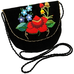 Hand beaded purse made from velvet. Fully lined. Extra long strap. Snap closure. Made in Lowicz, Poland.
Design is fixed but variations in color and shading vary from purse to purse.