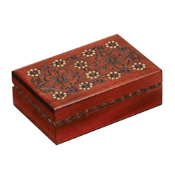 This beautiful box is decorated with a blossom design on the lid. Additional detailing around the sides of the box completes the piece. Handmade in the Tatra Mountain region of Poland.