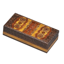 Highly detailed brass inlay and hand carving dominate the top and sides of this box. Geometric swirls and ellipses. Hinge lid. Handmade in Poland's Tatra Mountain region.
