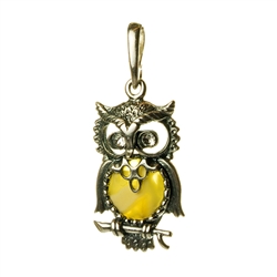 Hand made with Sterling Silver detail. Our silver owl has cubic zirconia crystal eyes too!