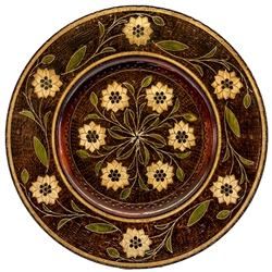 Hand Made in Nowy Sacz, Poland Polish wooden plates are made from Linden wood in the mountain region of southern Poland called Podhale. The plates are cut and shaped on a lathe by hand. The floral designs are burned into the wood then painted after staini