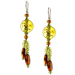 Bozena Przytocka is a designer of artistic amber jewelry based in Gdansk, Poland. Here is a beautiful example of her ability to blend amber and peridot to create a stunning set of earrings.