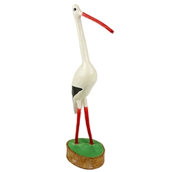 Storks return to their nests every summer in Poland and are especially popular in Polish folk art.  Hand carved and painted by famed Polish folk artist Andrzej Graczyk. Size is approx. 8" x 2" x 2.25" - 20cm x 5cm x 6cm..