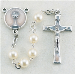 16" 5mm Imitation White Pearl Bead Rosary with a deluxe Crucifix and Center that is perfect for a First Communicant. It comes with a Clear Plastic Box