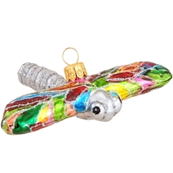 Beautifully crafted in Poland. .A rainbow of hand-painted hues coalesce with glittering silver accents in this spectacular design! Expertly mouth-blown in Poland, our glass dragonfly ornament measures approximately ¾" tall x 4" wide glass and is sure to m