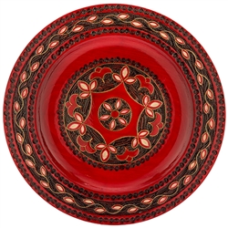 Polish wooden plates are made from Linden wood in the mountain region of southern Poland called Podhale.  The plates are cut and shaped on a lathe by hand.  The floral designs are burned into the wood then painted after staining and varnishing.