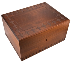 This is a simple yet gorgeous box! Handmade in Poland, this wooden box has crosses carved around the lid and base that make it a very elegant piece. This is also the correct size for holding the ashes of a loved one. Includes a lock and key.