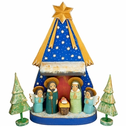 The Holy Family and in particular the Nativity is a popular theme in Polish folk art. Composed of hand painted and carved wooden pieces. Tallest figure is approx 4.5" tall. This is the work of folk artist Jerzy Zrbozek. All the figures are placed on the