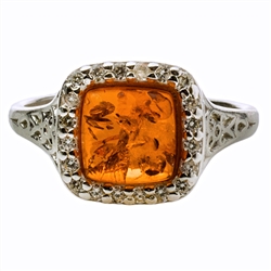 Beautifully designed classic silver setting for these honey amber stone surrounded by Cubic Zirconia crystal.