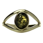Green colored amber "eye" set in sterling silver. Size approx. .5" x .25".
Honey colored amber when painted black on one side changes the color on the other side to appear green.
