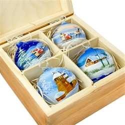 Hand painted glass ornaments in a deluxe painted wooden box. Magnetized lid. Hand made so no two ornaments or boxes are exactly the same. Ornaments are approx 2.25" in diameter.