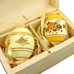 Hand painted duck eggs with floral designs inside a hand painted wooden box. The duck eggs have been blown empty and come with their own hangers. They come nested inside this beautiful box. Magnetized lid. Hand made so no two eggs or boxes are exactly ali