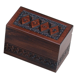 Holds two decks of cards. Walnut finish, card suit motif.