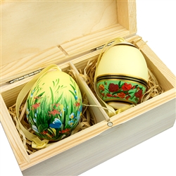 Beautifully hand painted duck eggs inside a hand painted wooden box. The duck eggs have been blown empty and come with their own hangers. They come nested inside this beautiful box. Magnetized lid. Hand made so no two eggs or boxes are exactly alike.