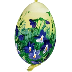 This beautiful hand painted goose egg comes ready to hang. The eggs have been emptied and strung through with ribbon for hanging. No two eggs are exactly alike and ribbon colors vary as well.