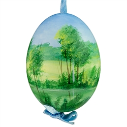 This beautiful hand painted duck egg comes ready to hang. The eggs have been emptied and strung through with ribbon for hanging. No two eggs are exactly alike and ribbon colors vary as well.