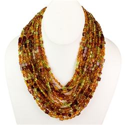 Bozena Przytocka is a designer of artistic amber jewelry based in Gdansk, Poland. Here is a beautiful example of her ability to blend amber and peridot to create a stunning necklace.