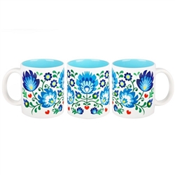 Colorful ceramic mug featuring a Polish paper cut pattern. Made in Poland.