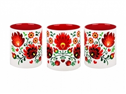 Colorful ceramic mug featuring a Polish paper cut pattern. Made in Poland.