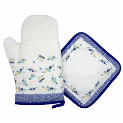 Colorful set of decorative mitt and holder set featuring a traditional Polish stoneware design. 100% polyester. These mitts are more decorative than useful as they do not have effective insulating material. Decorative only - not intended to handle heat.