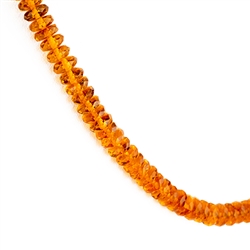 Lovely necklace composed of cognac colored faceted amber.  The facets make this necklace really sparkle. Amber screw closure.