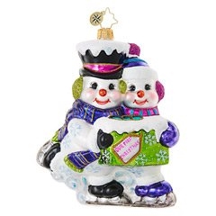 This snowy couple loves nothing better than to skate side-by-side in blissful synchronicity. Celebrate your first holiday romance with this delightful Christmas ornament for your tree!