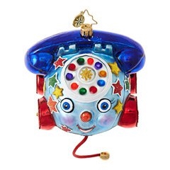 Here's truly unusual take on the mobile phone! This one is a multicolored, pullable model on wheels with a cute face and old time rotary dial styling.