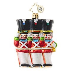 A toy boat on wheels makes for a nautically Merry Christmas! It's a totally see-worthy ornament with its beautifully hand-painted red, white, blue and gold design.