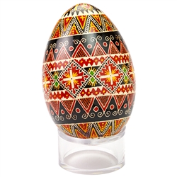 This beautifully designed and executed turkey egg is hand painted by our artist from Canada using the traditional batik method. The egg has been emptied through two small holes at each end of the egg. Stand sold separately.