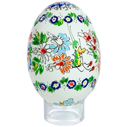 This beautifully designed chicken egg is hand painted by master folk artist Alina Wypchlo from Opole, Poland. Her colors are strong and bright. Look carefully and you will find humorous folk elements of nature incorporated into her designs (i.e. a cricket