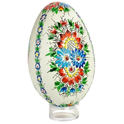 This beautifully designed goose egg is hand painted by master folk artist Alina Wypchlo from Opole, Poland. Her colors are strong and bright. Look carefully and you will find humorous folk elements of nature incorporated into her designs (i.e. a cricket