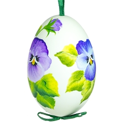 This beautiful hand painted duck egg comes ready to hang. The eggs have been emptied and strung through with ribbon for hanging. No two eggs are exactly alike and ribbon colors vary as well.