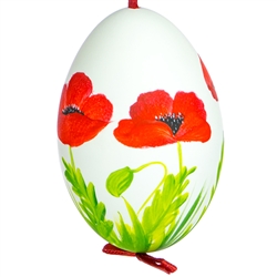 This beautiful hand painted duck egg comes ready to hang. The eggs have been emptied and strung through with ribbon for hanging. No two eggs are exactly alike and ribbon colors vary as well.