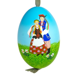 This beautiful hand painted goose egg comes ready to hang. The eggs have been emptied and strung through with ribbon for hanging. No two eggs are exactly alike and ribbon colors vary as well. Signed by the artist.