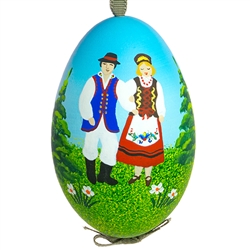 This beautiful hand painted goose egg comes ready to hang. The eggs have been emptied and strung through with ribbon for hanging. No two eggs are exactly alike and ribbon colors vary as well.  Signed by the artist.