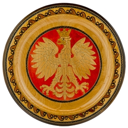 Hand Made in Southern Poland This beautiful plate is made of seasoned beech wood, from the Tatra Mountain region of Poland. The skilled artisans of this region employ centuries old traditions and meticulous craftsmanship to create a finished product of