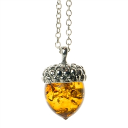 Beautiful sterling silver pendant and adjustable length chain, with honey amber in the shape of an acorn.