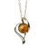 Artistic sterling silver pendant and adjustable length chain, surrounding a honey amber sphere.