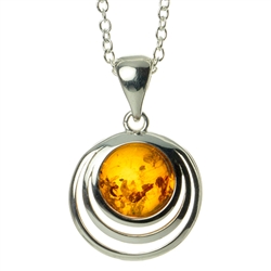 Elegant sterling silver pendant and adjustable length chain, framing a beautiful sphere of honey amber.