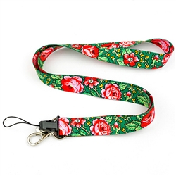 The folk lanyard is adorned with colorful flowers similar to those found on Tibetan highlander cloth. The motif is inspired by a traditional folk pattern known from the folk headscarf and the ladies' highlander attire.