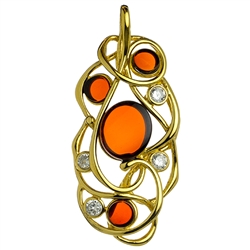 Free form gold vermeil pendant highlighted with cherry amber cabochons and cubic zirconia.