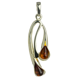 Drop of honey amber wrapped in silver in a calla lily shape.  Stylish and unique.