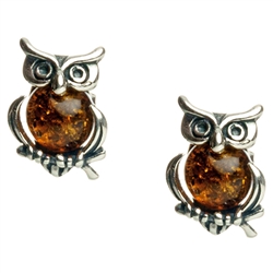 Charming sterling silver owl earrings with honey amber tummy.