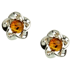 Gorgeous Baltic Amber round stud earrings surrounded with a star shaped Sterling Silver setting.