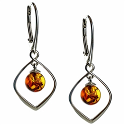 Honey amber drops suspended in sterling silver. Stylish and unique.